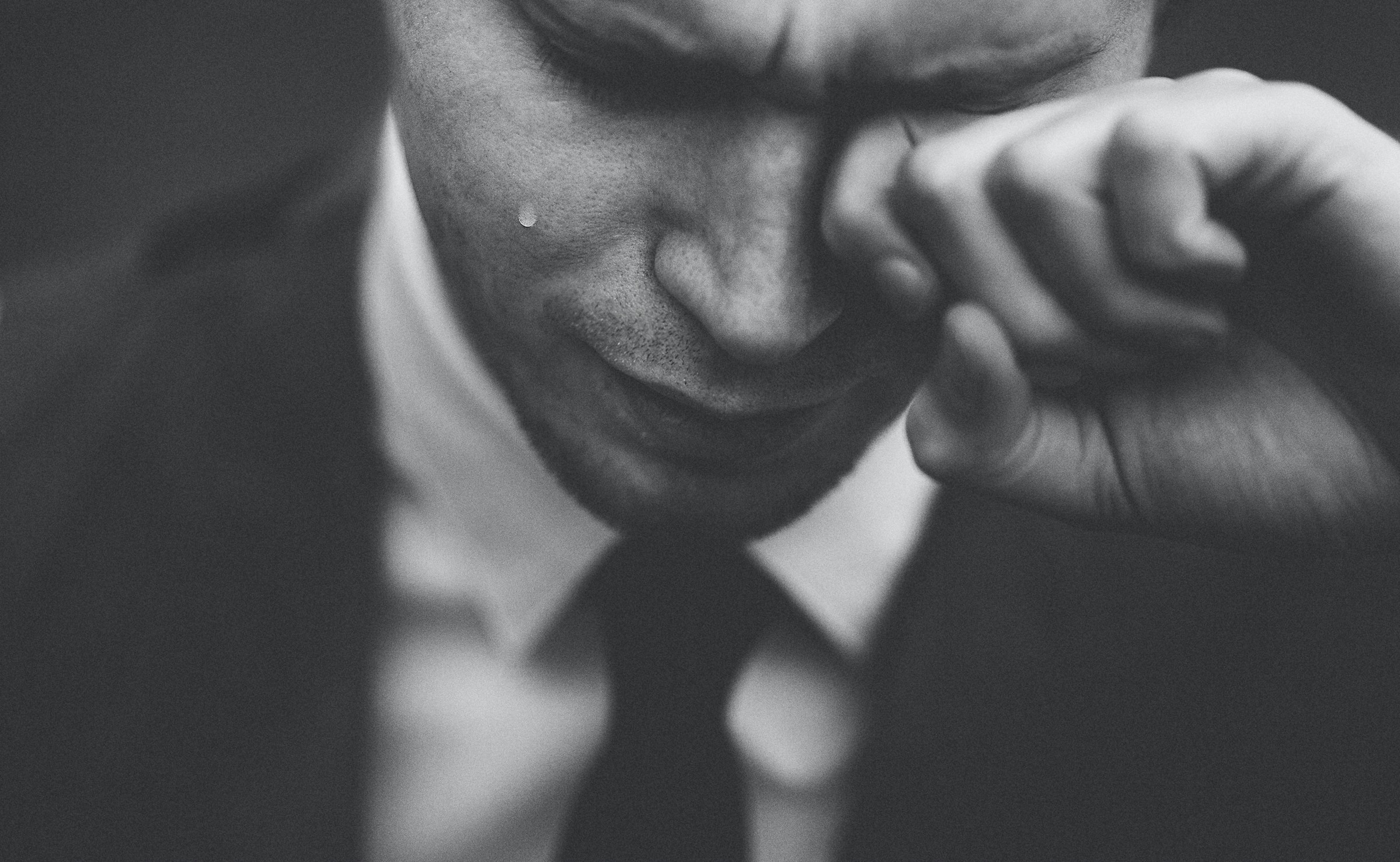Man crying in black and white
